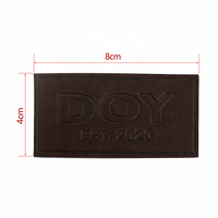Patchs en cuir véritable de haute qualité avec logo en relief personnalisé pour chapeaux