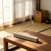 Brûleur d'encens artisanal en pierre texturée, design long et élancé, décoration zen pour espace de méditation, ornement de table pour salle de yoga