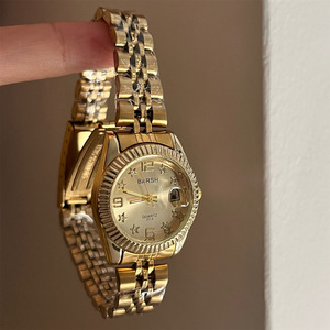 Montre à quartz <span class=keywords><strong>pour</strong></span> femme, cadran étoilé scintillant d'inspiration vintage, bracelet en alliage doré, <span class=keywords><strong>lunette</strong></span> cannelée, date - Product Image 1