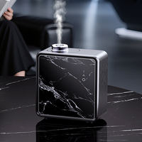 Diffuseur d'arômes électrique de luxe sans eau pour hôtels et espaces commerciaux, idéal pour les halls d'hôtel et la diffusion d'huiles essentielles.