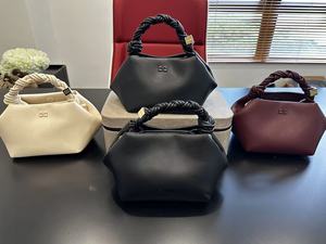 <span class=keywords><strong>Sac</strong></span> à <span class=keywords><strong>main</strong></span> bandoulière hexagonal tissé en <span class=keywords><strong>cuir</strong></span> véritable de luxe pour femme, avec boucle magnétique, étanche, vente en gros GANN Chine - Product Image 4