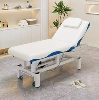 Table de massage moderne pliable et réglable pour chambre et salon