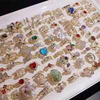 Bague ajustable vintage en cuivre, micro-pavée et micro-incrustée de zircons colorés, plaquée or, avec mélange de pierres CZ et de zircons, pour