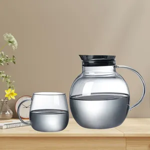 OEM Factory Borosilicate Heat Resistant Glass Pitcher With Handle Stainless Steel Lid Hot Water Glass Carafe Glass Tea Jug