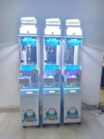 Machine de jeu à griffes miniature à pièces, machine à griffes Candy World, machine à poupées avec accepteur de billets de banque à vendre