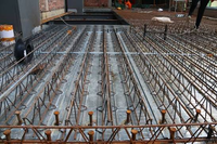 Plancher en treillis d'acier pour remplacer le coffrage traditionnel coulé sur site pour les bâtiments à grande portée en structure métallique