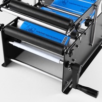 Machine d'étiquetage manuelle ZZY pour bouteilles d'eau rondes en plastique PET PVC, cosmétiques, vin, boîtes de conserve