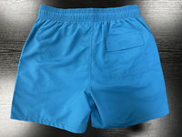Shorts de bain unisexes d'été à séchage rapide et respirants, taille mi-haute, avec poches, en polyester uni teint, élastiques