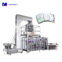 Machine d'emballage verticale automatique à 12 têtes avec peseuse multi-têtes pour produits de soin de la peau et masques faciaux, machine de mise en carton pour le marché européen