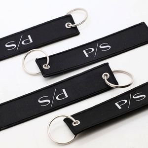 Wholesale Personalized Minimalist Monogram Woven Fabric Jet Tag Keychain <b>for</b> Corporate Apparel Brand Merchandise - Product Image 2