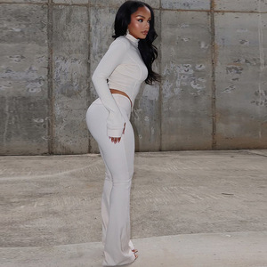 Trajes de Club sexy informales para mujer New Street Wear Conjunto de dos piezas Patrón sólido Top de longitud corta y pantalones a juego - Product Image 4