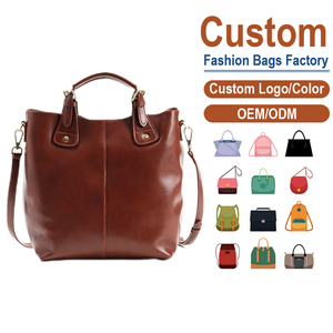 กระเป๋าหนังวัวฟอกฝาดทรงถัง สีน้ำตาลคาราเมล สไตล์เรโทร พรีเมียม ความจุเยอะ สะพายข้างหรือถือได้ รับผลิตตามแบบ OEM - Product Image 1