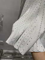 Nouvelle Collection 2026 : Ensemble Tricoté Chic et Confortable – Top Ajusté à Strass et Mini-Jupe à Volants – Deux Pièces Tricotées pour l'Été