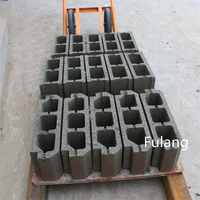 Machine de fabrication de blocs de ciment et de briques creuses vibrantes QTJ4-40 à haute marge - Prix compétitif