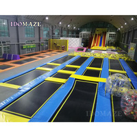 Parc de trampolines intérieur en gros directement de l'usine avec filet de sécurité complet, zone de saut en libre pour centres commerciaux et événements