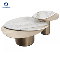 Table basse ovale à emboîtement avec plateau en marbre naturel et base en métal mat, style minimaliste pour salon de villa, vente en gros, usine OEM