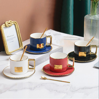 Fournisseur de Chaozhou, tasse à café en céramique de luxe avec bordure dorée nordique, tasse à café et soucoupe avec cuillère pour la maison et les restaurants