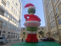 Ballon gonflable géant Zhenmei de 50 pieds, monstre vert Grinch, avec ventilateur intégré et installation facile, tenant une boîte cadeau