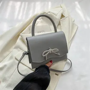 Bolso cuadrado pequeño de diseño minimalista de gran venta para mujer en otoño de 2023, nuevo bolso de moda, bandolera de un hombro