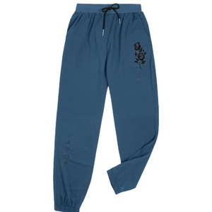 Pantalon de jogging décontracté en toile pour homme, taille mi-haute, coupe ample, avec poches et cordon de serrage, idéal pour la gym et l'entraînement - Product Image 1