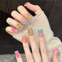 Faux ongles à presser en acrylique dégradé rose nude, longueur moyenne, pointes effilées, motif papillon doré, couronne de fleurs, fleur rose pour fournisseur d'ongles