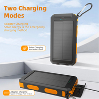 Ventes chaudes Banque d'alimentation solaire portable 20000 mAh Chargeur solaire extérieur avec 3 câbles intégrés Boussole Lampes de poche LED Panneaux solaires