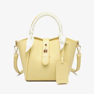 Litchi-grain leather women's <b>bag</b> with <b>gold</b> lock and designer tag - Product Image 3