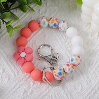 Niedliches Blumen-Silikon-Perlenarmband mit Blumendruck, elastisches Schlüsselband, Handtaschenanhänger, Damen-Taschenaccessoire