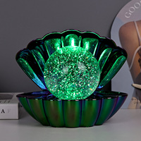 Lampe de table LED à lumière liquide changeante de couleur RGB avec un design brillant et une grande forme de coquille