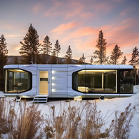 Capsule spatiale préfabriquée avec murs en verre panoramiques pour projets de villégiature dans le désert et de retraite pour l'observation des étoiles