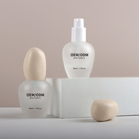 Vente en gros d'usine, flacon en verre givré ovale de 30 ml, emballage élégant pour sérum de soin de la peau ou crème pour le visage