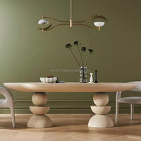 Table à manger ovale en bois de style Japandi antique pour 6 à 8 personnes avec piédestal empilé artistique pour salle à manger