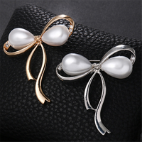 Broches en alliage de galvanoplastie avec nœud en diamant pour femmes, plaqué or, perle, perle, plaqué argent, les plus populaires