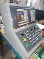 Tour CNC économique à lit plat, rentable, avec programmation simple, idéal pour les petites ateliers et la formation
