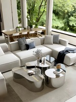 Table à thé moderne de luxe en acier inoxydable et argent Table basse combinée en métal de forme irrégulière pour le salon