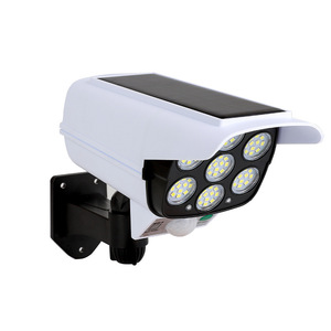 Lámpara de Pared LED con Sensor de Movimiento Simulando una Cámara, Alimentada por Energía Solar, con Control Remoto, para Exteriores - Product Image 1