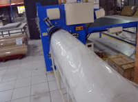 Machine à compresser et à rouler les matelas