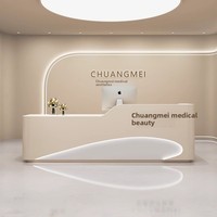 Comptoir de réception et de caisse en cuir, design minimaliste moderne, pour bureaux, cabinets médicaux et salons de beauté, avec design de bar incurvé, mobilier de style industriel