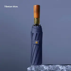 Vente en gros de 10 nervures avec manche en bois entièrement automatique Parapluie d'affaires Pare-soleil pliable pour le soleil - Product Image 4