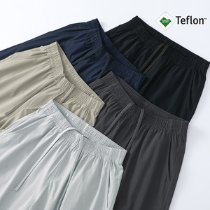 Shorts d'été décontractés pour hommes, séchage rapide, résistants à l'eau, extensibles dans quatre directions, légers, taille élastique, design cinq points, motif uni - Product Image 3