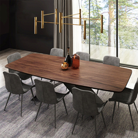 Table à manger minimaliste italienne moderne, grande table rectangulaire en noyer avec base en X architecturale, ensemble de salle à manger pour 8 à 10 personnes