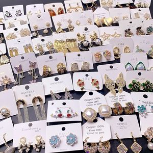 Les boucles d'oreilles diamant et perle de luxe léger sont à la mode et polyvalentes. Les boucles d'oreilles de style français sont plaquées d'or véritable - Product Image 1
