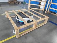 Robot mobile autonome (AMR) robuste pour la manutention de palettes en entrepôt, avec technologie SLAM laser, capacité de levage de 50 kg à 4000 kg.