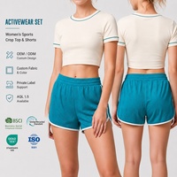 Ensemble de yoga personnalisé avec short en mesh et haut court à manches courtes, bordure contrastante, doublure double couche, pour entraînement sportif, gym et studio