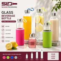 Bouteille d'eau en verre transparent réutilisable de 500 ml avec couvercle en acier inoxydable, design moderne