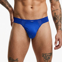 Sous-vêtements pour hommes sexy et respirants en Spandex/Nylon, style G-string/Thong, coupe basse, avec poche en U, doux, motif nid d'abeille, pour soirées piscine