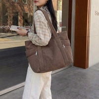 Sac fourre-tout transfrontalier 2026, nouveau style simple et tendance, sac à bandoulière moyen à fermeture éclair grande capacité, style artistique quotidien, sac mère-fille