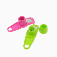 Ustensile de cuisine magique moderne et écologique en plastique coloré, outil de broyage de gingembre et d'ail, éplucheur, trancheur, coupe-légumes