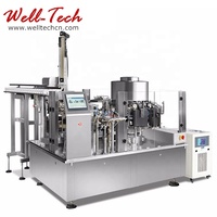 Machine de remplissage et d'emballage rotative sous vide pour sachets préformés de snacks de fruits de mer, à commande PLC automatique, de Wenzhou, Chine