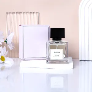 Frasco de perfume de vidro transparente com tampa luxuosa de 30 ml e 50 ml de alta qualidade
